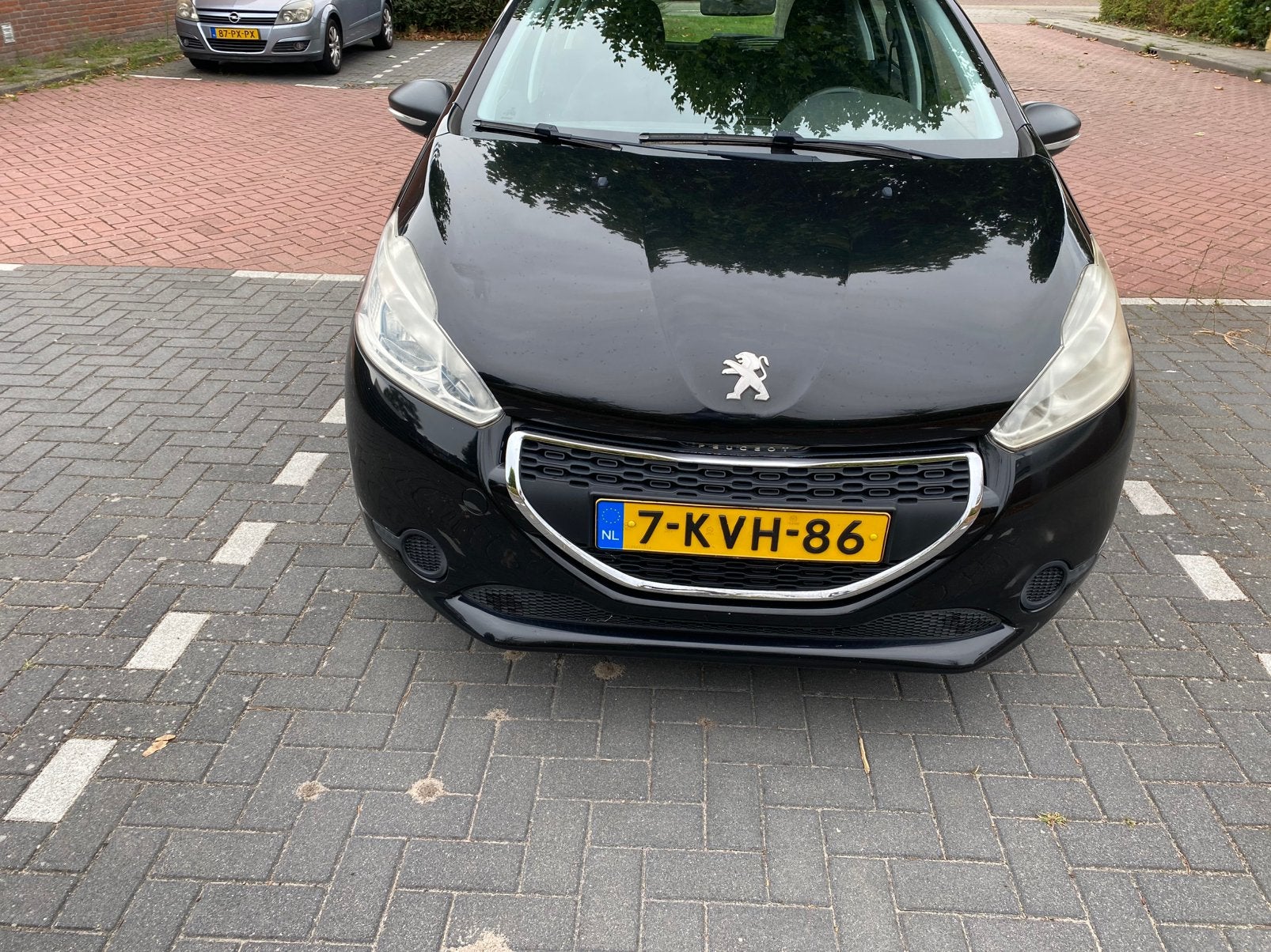 Peugeot 208 1.2 VTI 60KW/82PK 5-D 2013 Zwart, Auto's, Voorwielaandrijving, 31 €/maand, 1199 cc, Zwart