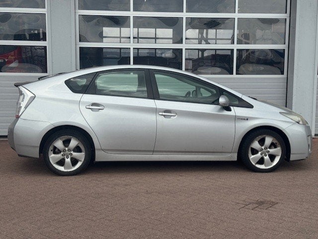 Toyota Prius 1.8 Aspiration - Head up - Keyless - PDC-Cruise, Auto's, Gebruikt, Zwart, 4 cilinders, Bedrijf