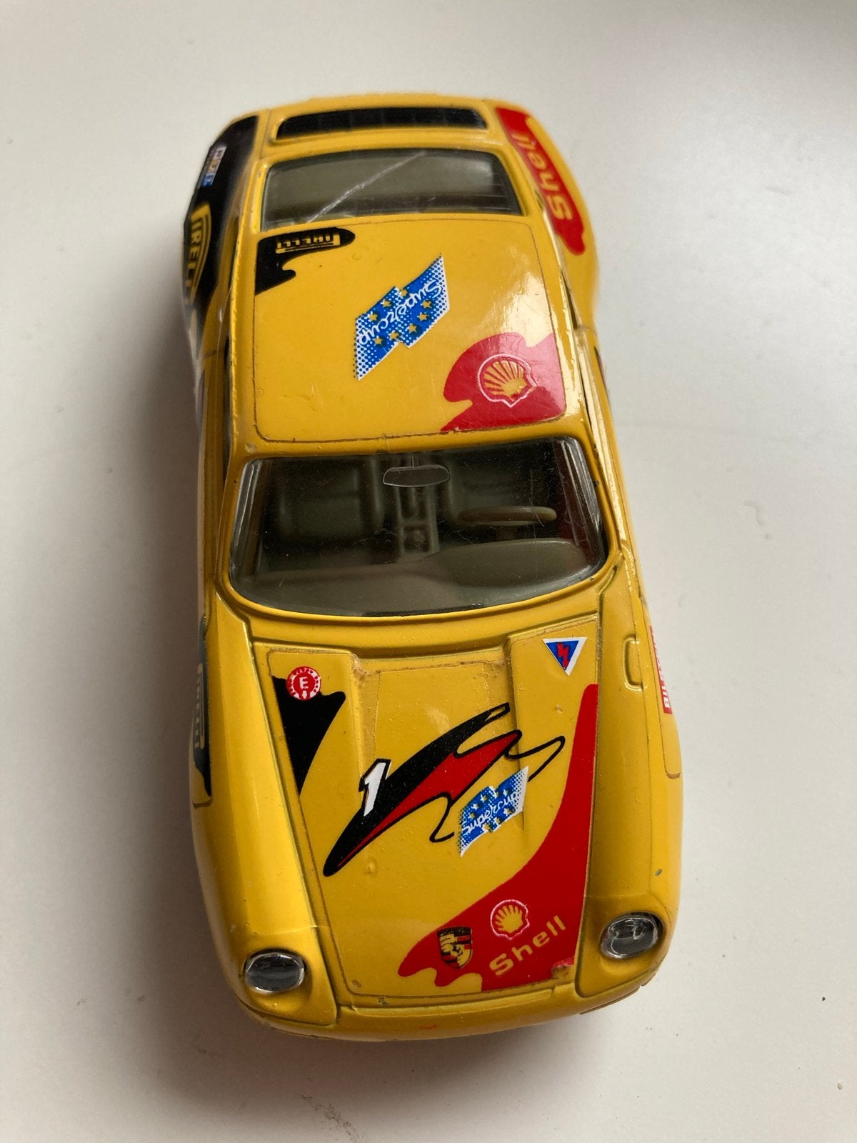 Bburago Porsche 911 Carrera 1/33 - Geel raceauto model, Ophalen of Verzenden, Gebruikt, Auto