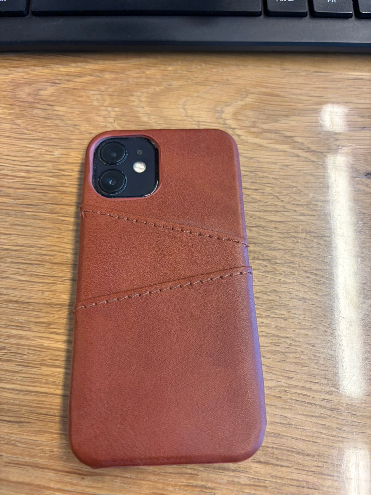 Foto 3 van Iphone 12 mini inclusief hoesje