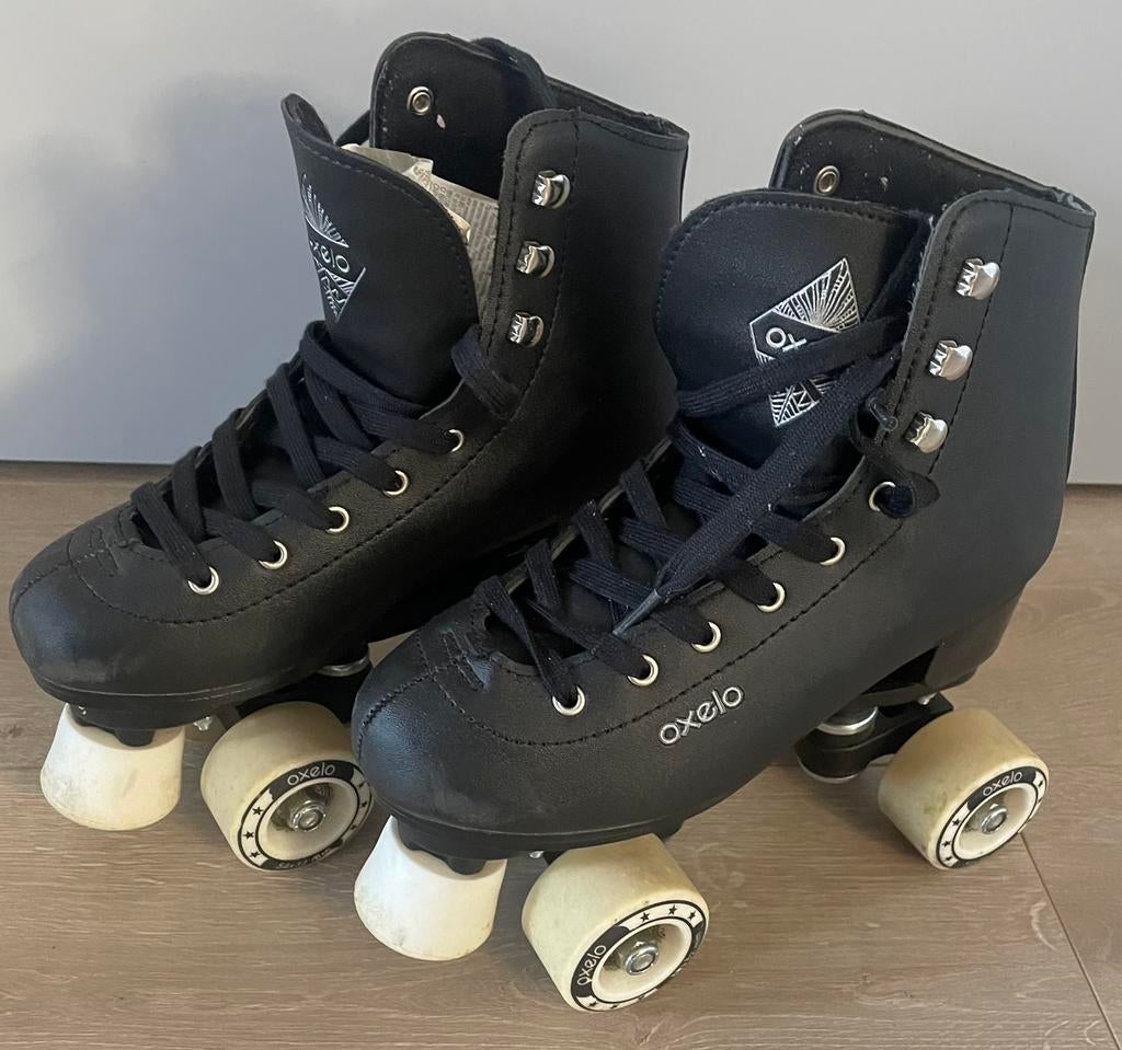 Rolschaatsen zwart maat 37 RS Quad 100, Ophalen of Verzenden, Zo goed als nieuw