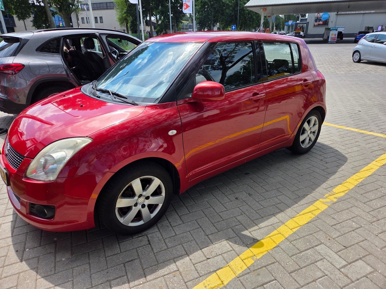 Suzuki Swift 1.3 5DRS 2008 Rood, Auto's, Voorwielaandrijving, Stof, 40 €/maand, Zwart