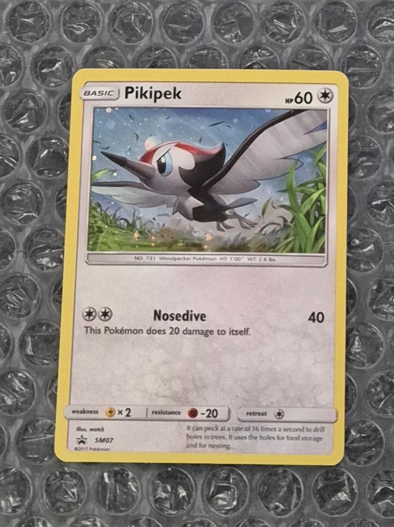 Cosmos Holo Pikipek SM07 Sun & Moon Black Star Promo, Ophalen of Verzenden, Gebruikt, Losse kaart, Foil