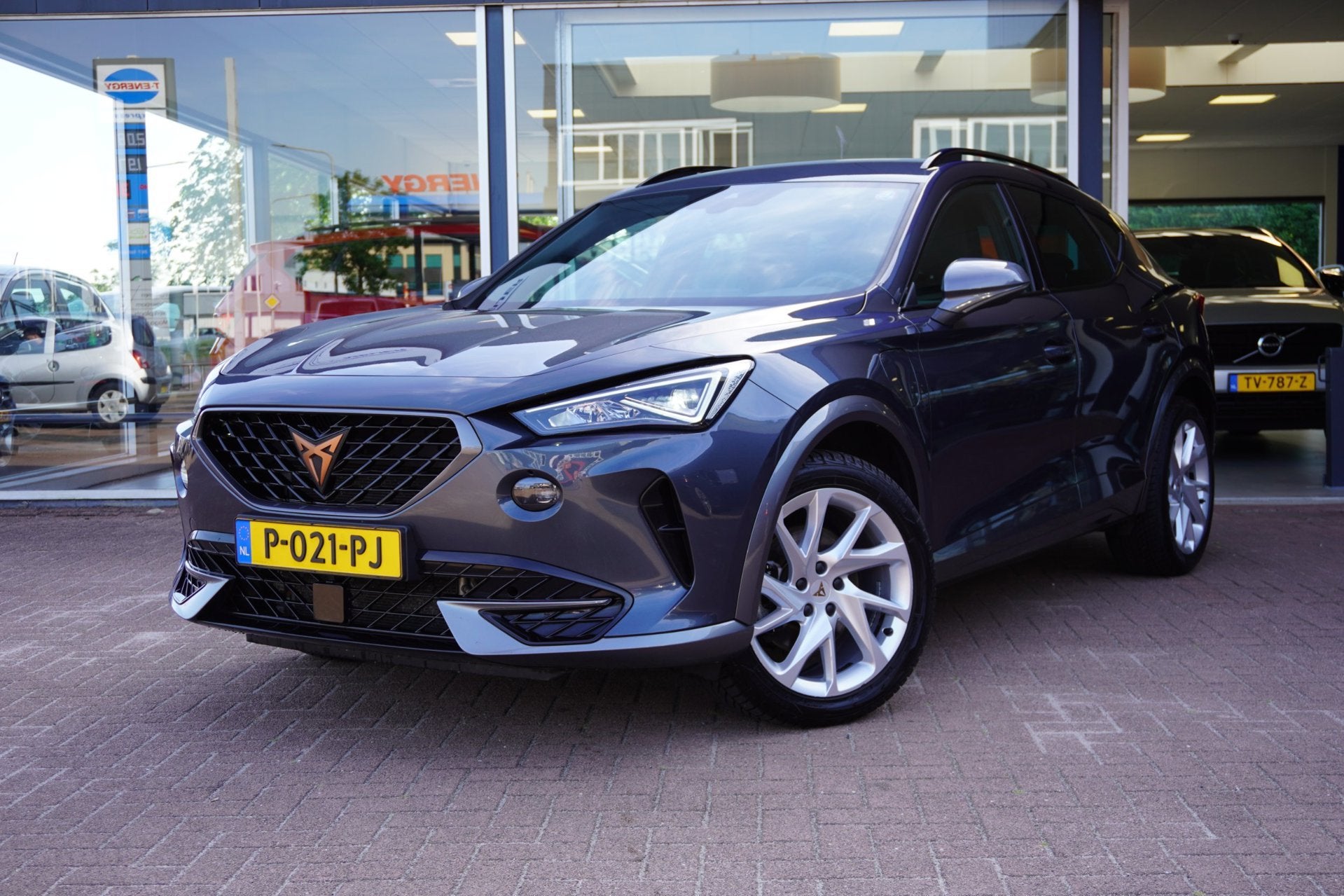 Cupra Formentor 1.4 e-Hybrid Business Automaat | Airco | Nav, Auto's, Dealer onderhouden, Gebruikt, 4 cilinders, Leder en Stof
