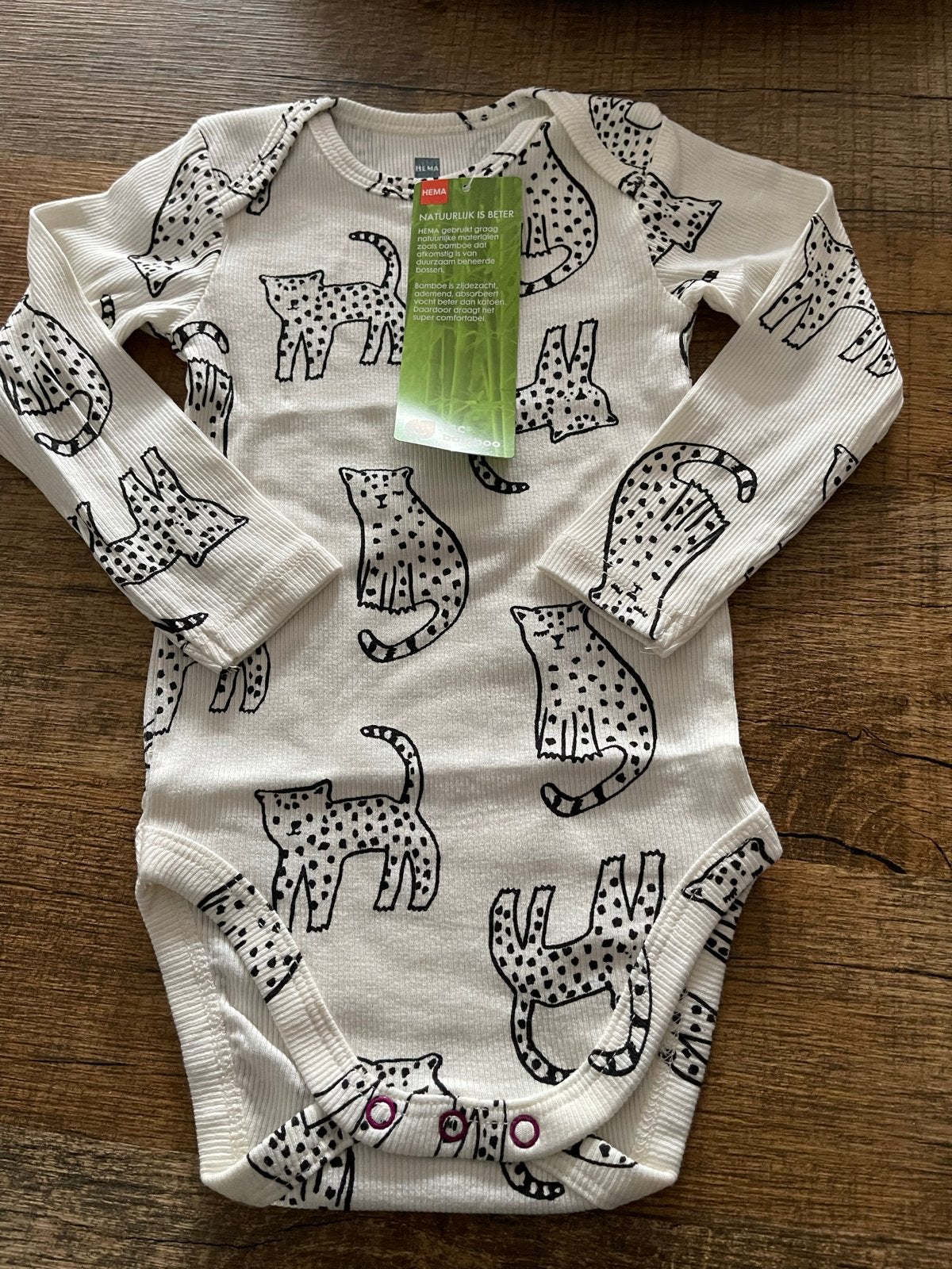 Nieuw HEMA Romper met Luipaardprint Maat 62/68, Kinderen en Baby's, Ophalen of Verzenden, Nieuw, Jongetje of Meisje