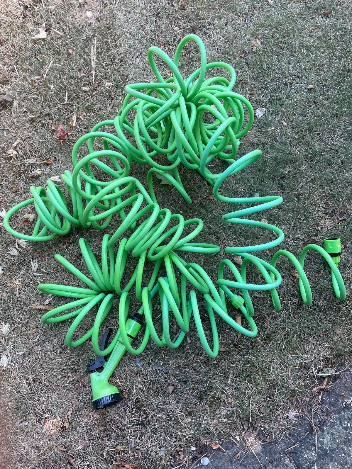 Groene spiraal tuinslang met spuitmond 10 m, Ophalen of Verzenden, Gebruikt, Tuinslang