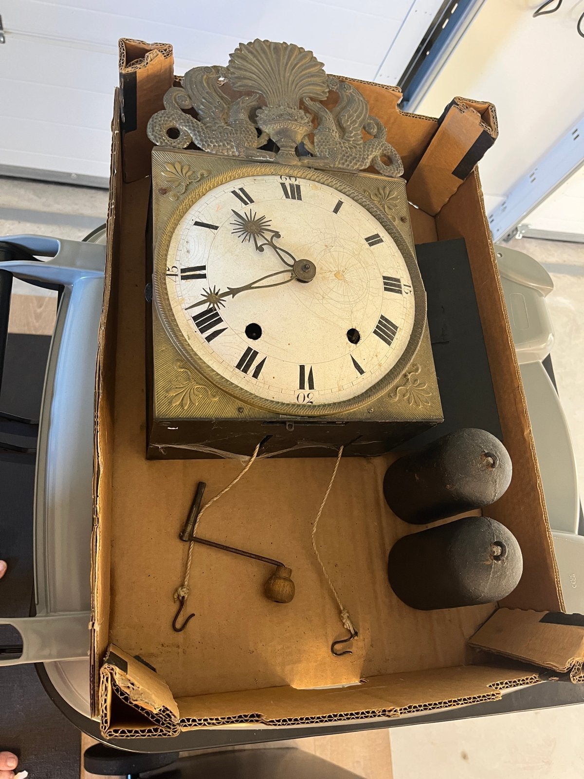 Antieke klok uit 1825 -comtoise, Ophalen