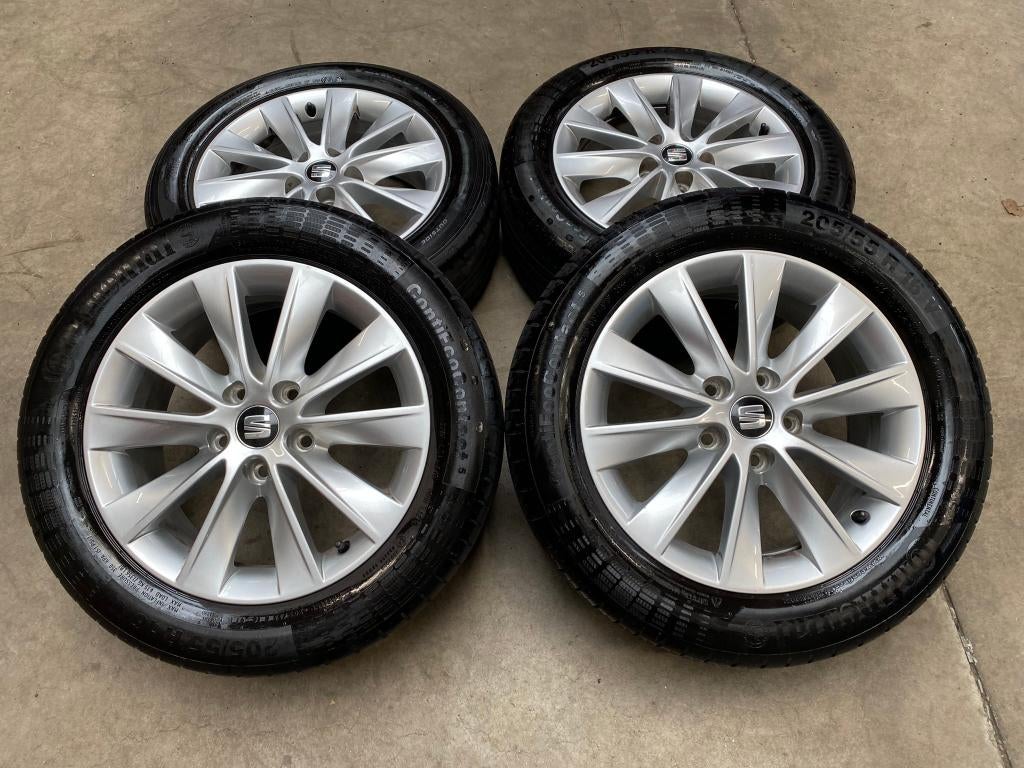 16 inch originele velgen + vier seizoenen banden Seat Leon