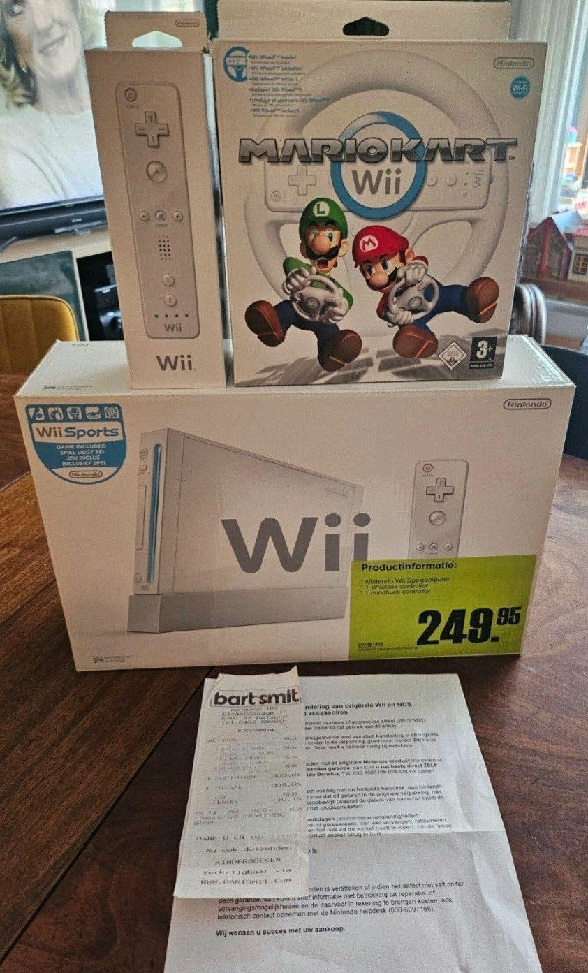 Nintendo Wii Sports editie + Wii mote + Mario Kart pack CIB., Ophalen of Verzenden, Zo goed als nieuw, Met 2 controllers, Met stuurtje