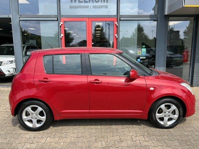 Suzuki Swift 1.3 5D Comfort (RIJKLAARPRIJS), Auto's, Dealer onderhouden, Stof, 965 kg, 400 kg