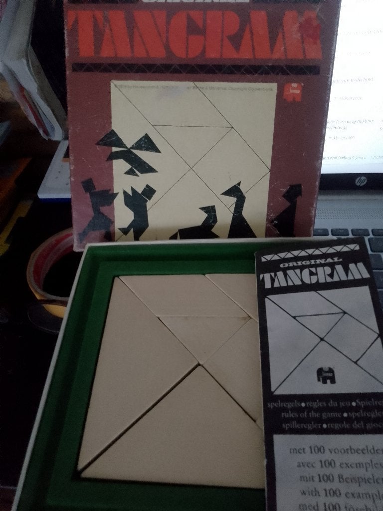 tangram  in doos met 100 voorbeelden, Ophalen
