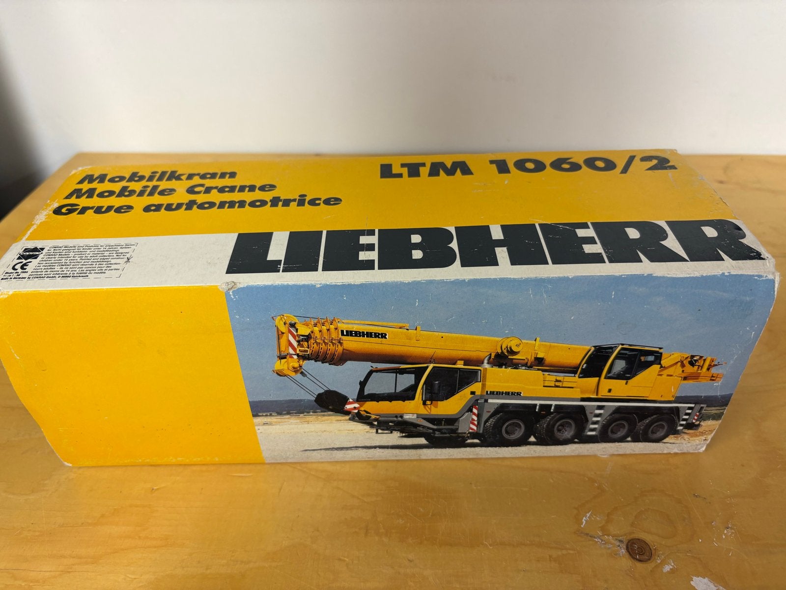 Liebherr LTM 1060/2 Conrad kraan 1:50, Hobby en Vrije tijd, Modelauto's | 1:50, Ophalen of Verzenden, Zo goed als nieuw, Hijskraan, Tractor of Landbouw