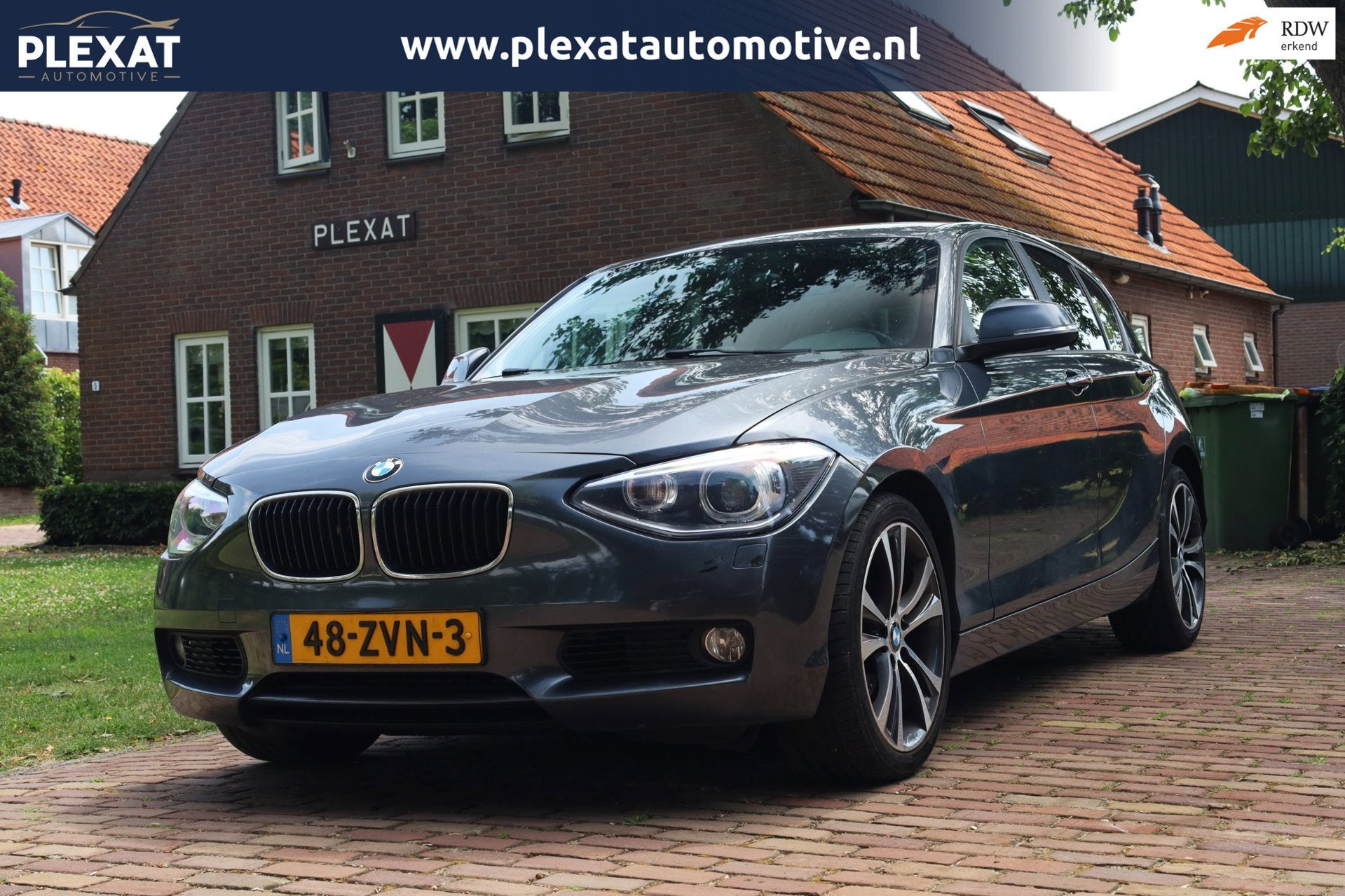 BMW 1-serie 118i Upgrade Edition Aut. | Xenon | Lederen Stoe, Auto's, BMW, Euro 5, Achterwielaandrijving, Gebruikt, Zwart