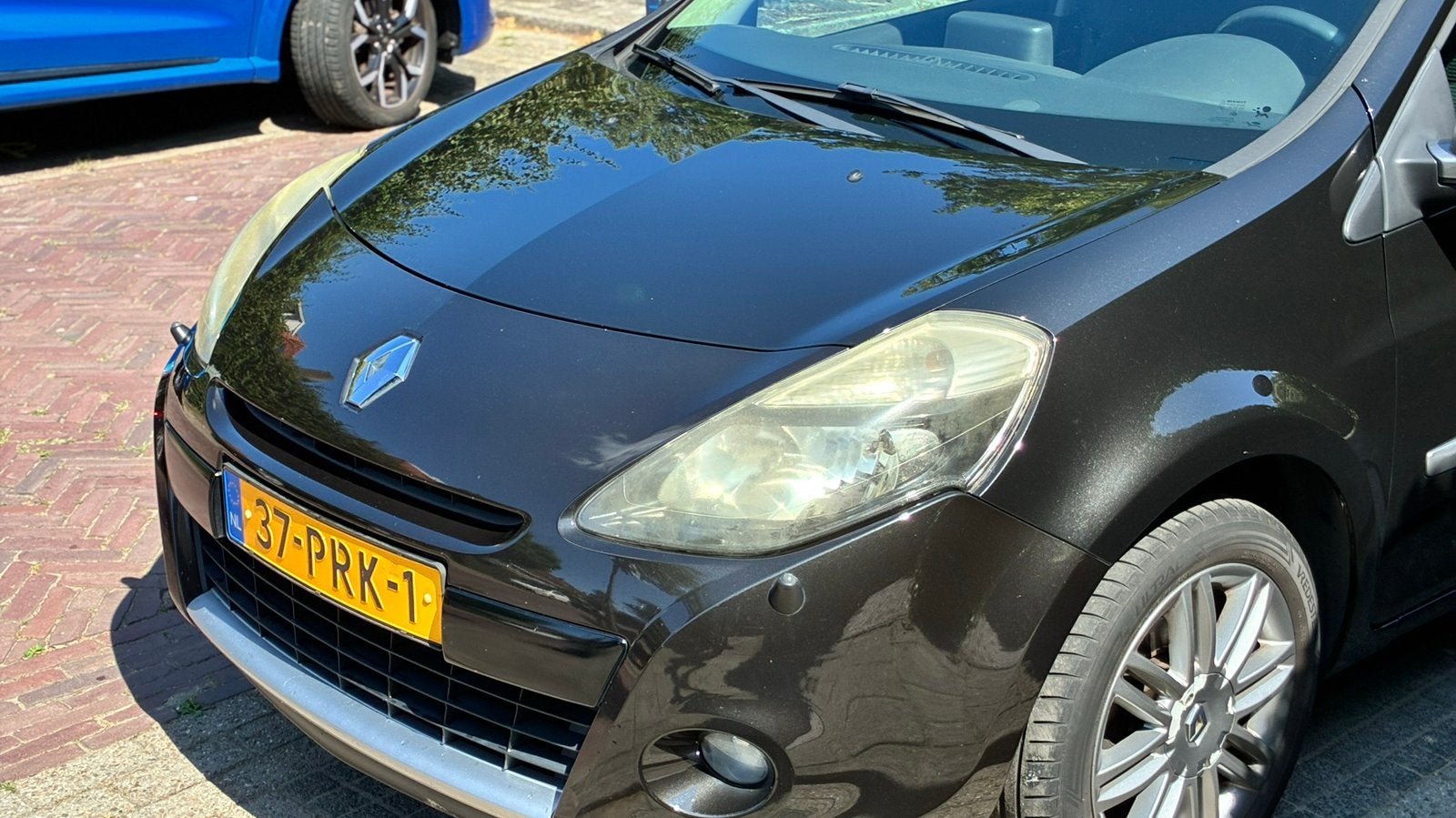 Mooie Renault Clio 1.2 TCE 5-DRS uit 2011, 20th Unniversary, Voorwielaandrijving, Euro 5, Navigatiesysteem, Zwart