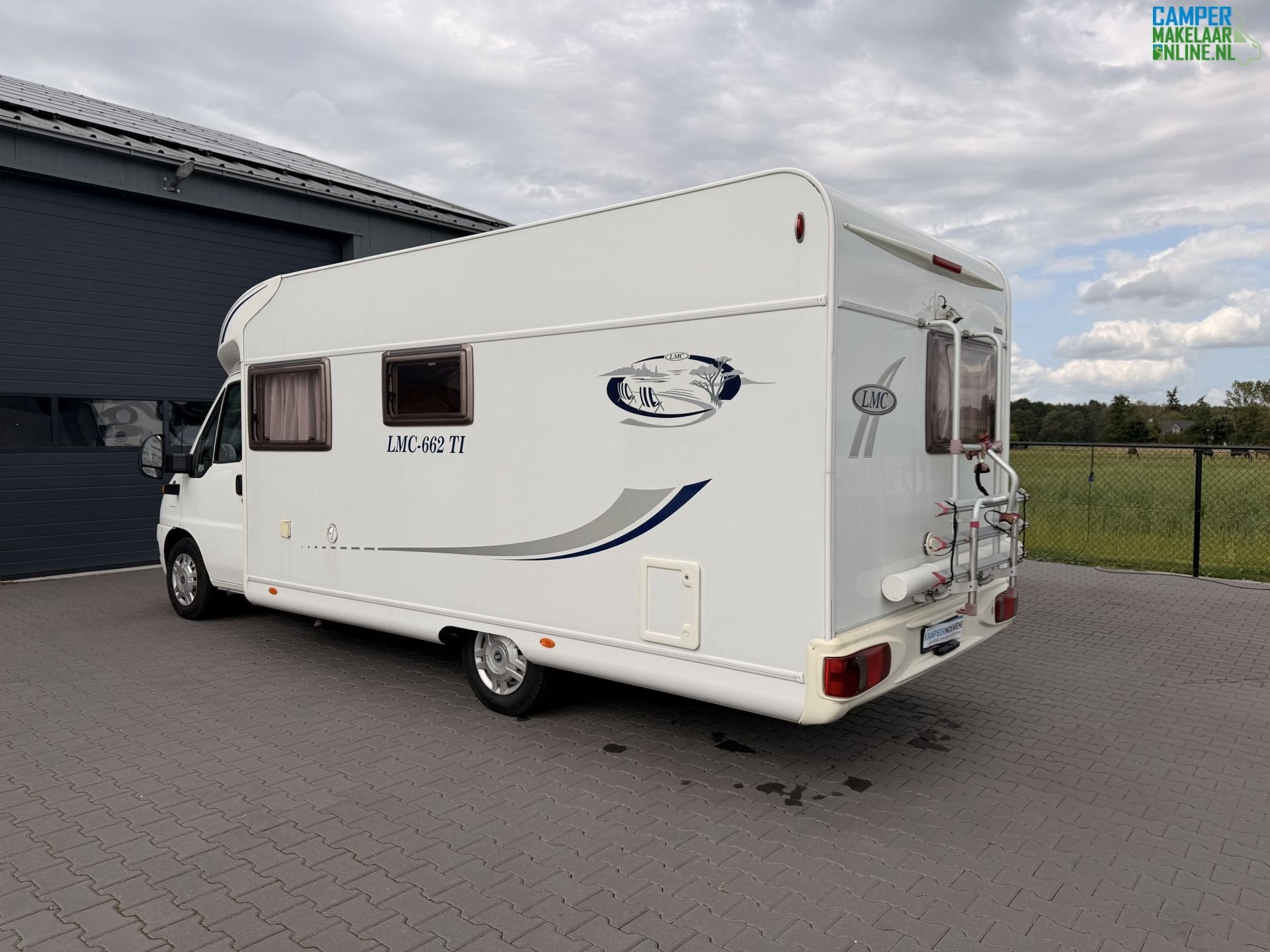 LMC Liberty 662 TI | Frans bed | Airco | Scherpe prijs!, Luifel, 6 tot 7 meter, Bedrijf, 6 tot 7 meter