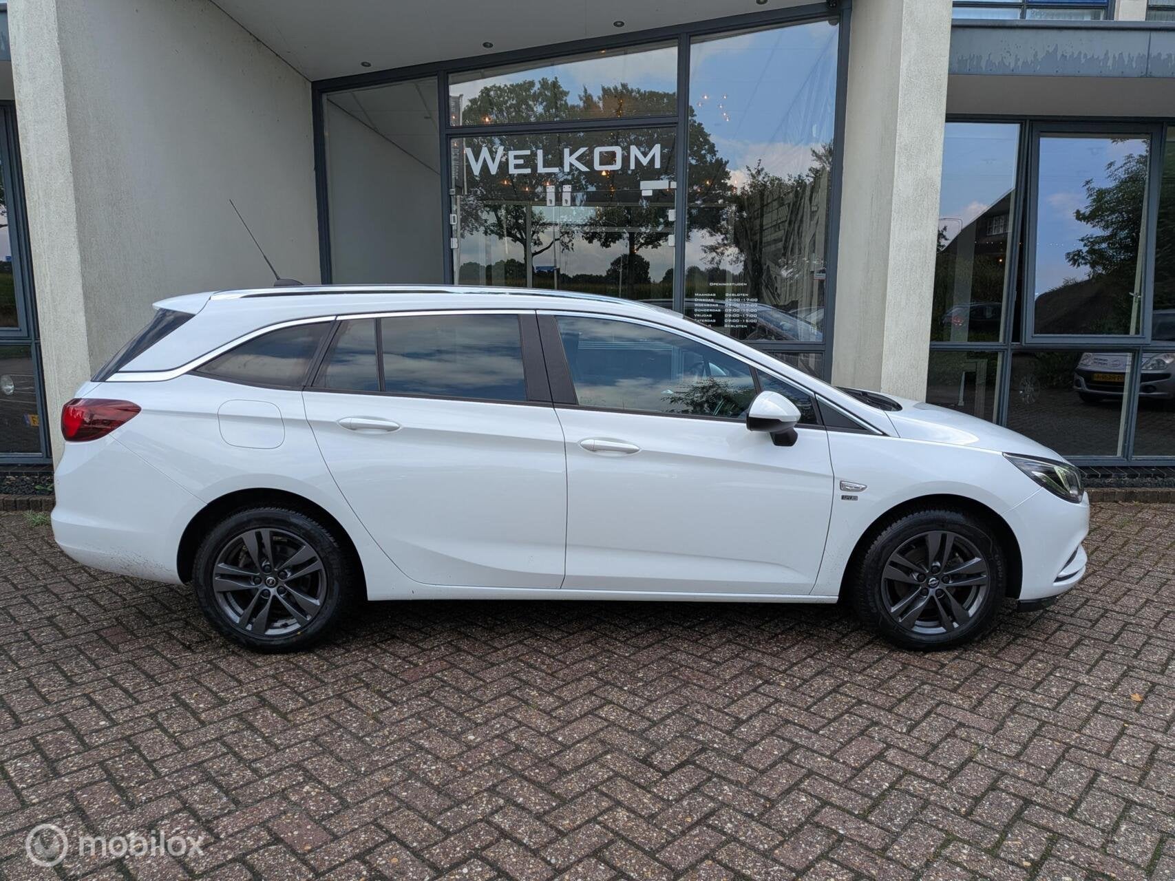 Opel Astra Sports Tourer 1.0 Turbo 120 Jaar Edition, Auto's, Voorwielaandrijving, Euro 6, 1178 kg, 620 kg