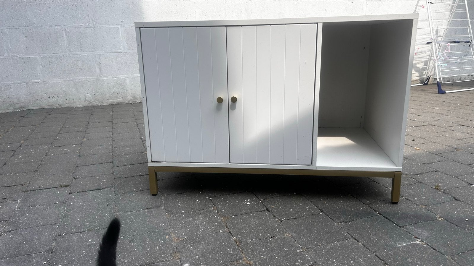 Kast voor kattenbak, Ophalen