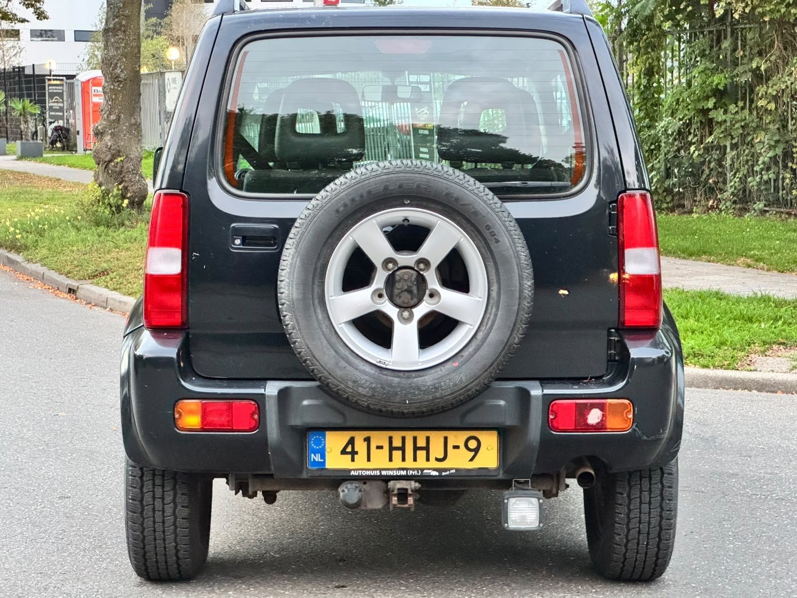 Suzuki Jimny 1.3 Exclusive|4WD|AIRCO|CRUISE|ELEKRAMEN|NAP|BO, Dealer onderhouden, 86 pk, 4 stoelen, Zwart