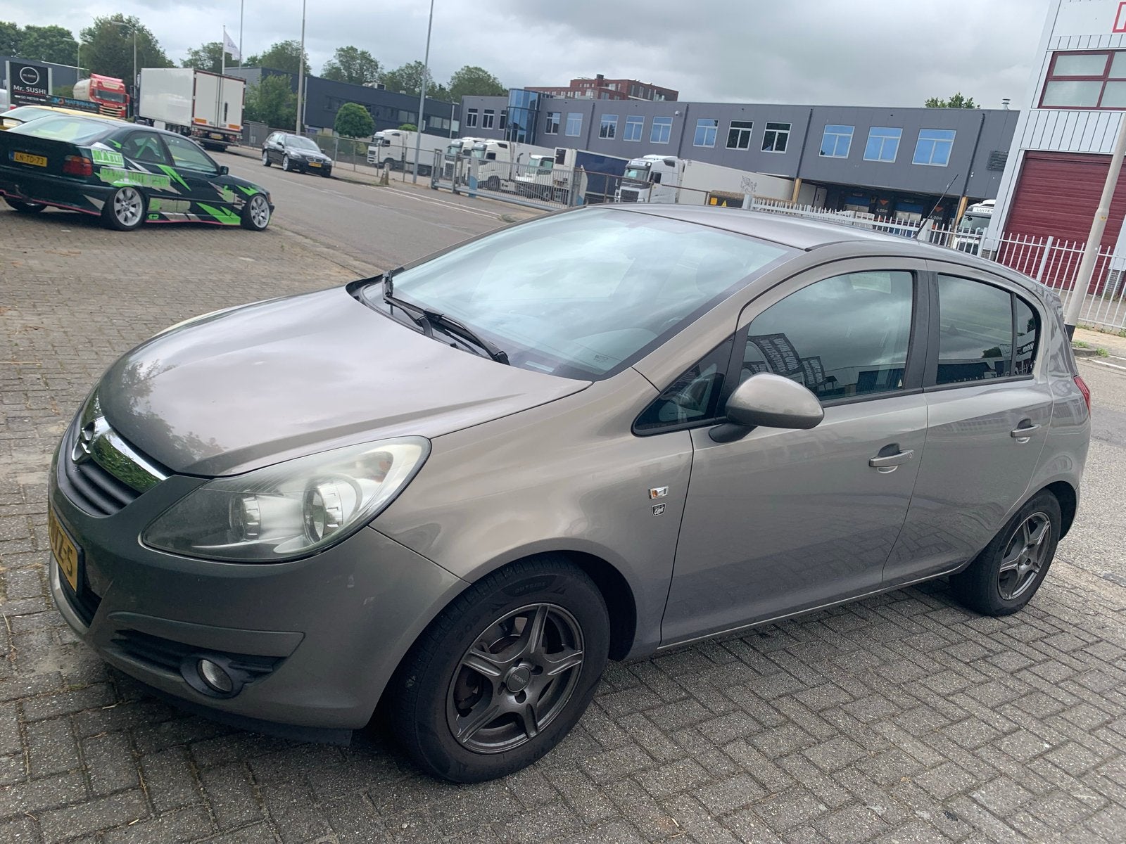 Opel Corsa 1.2 16V AUTOMAAT 2010 Bruin, 750 kg, 4 cilinders, Bruin, 1229 cc