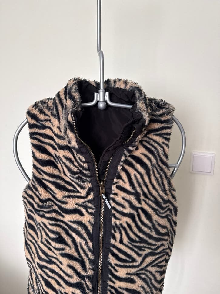 Omkeerbaar bodywarmer met zebraprint en zwart, Ophalen of Verzenden, Zo goed als nieuw, Maat 34 (XS) of kleiner, Zwart