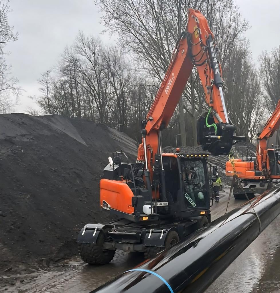 Doosan DX165W 2017 met draaikantelstuk & gripper, Ophalen, Kraan