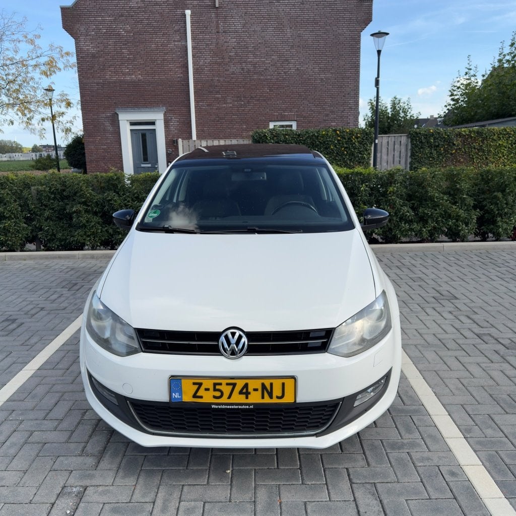 Volkswagen Polo 1.2 TSI 77KW DSG 2012 Wit, Auto's, Euro 5, 40 €/maand, Zwart, 4 cilinders