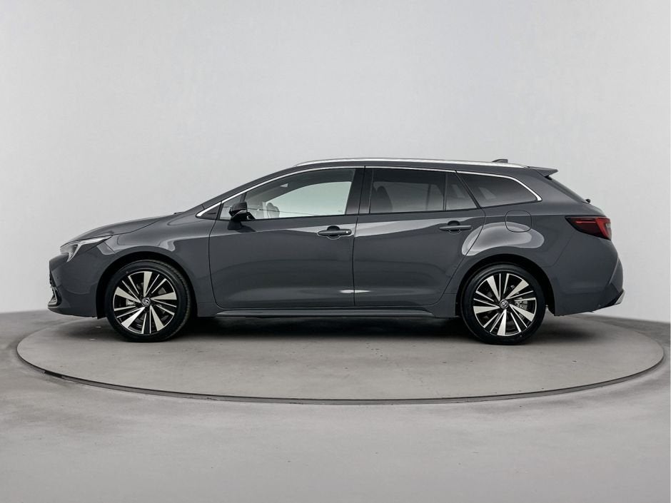 Toyota Corolla Touring Sports Hybrid 140 Dynamic | Voorraad, Auto's, 12 maanden, Stof, Zwart, 4 cilinders