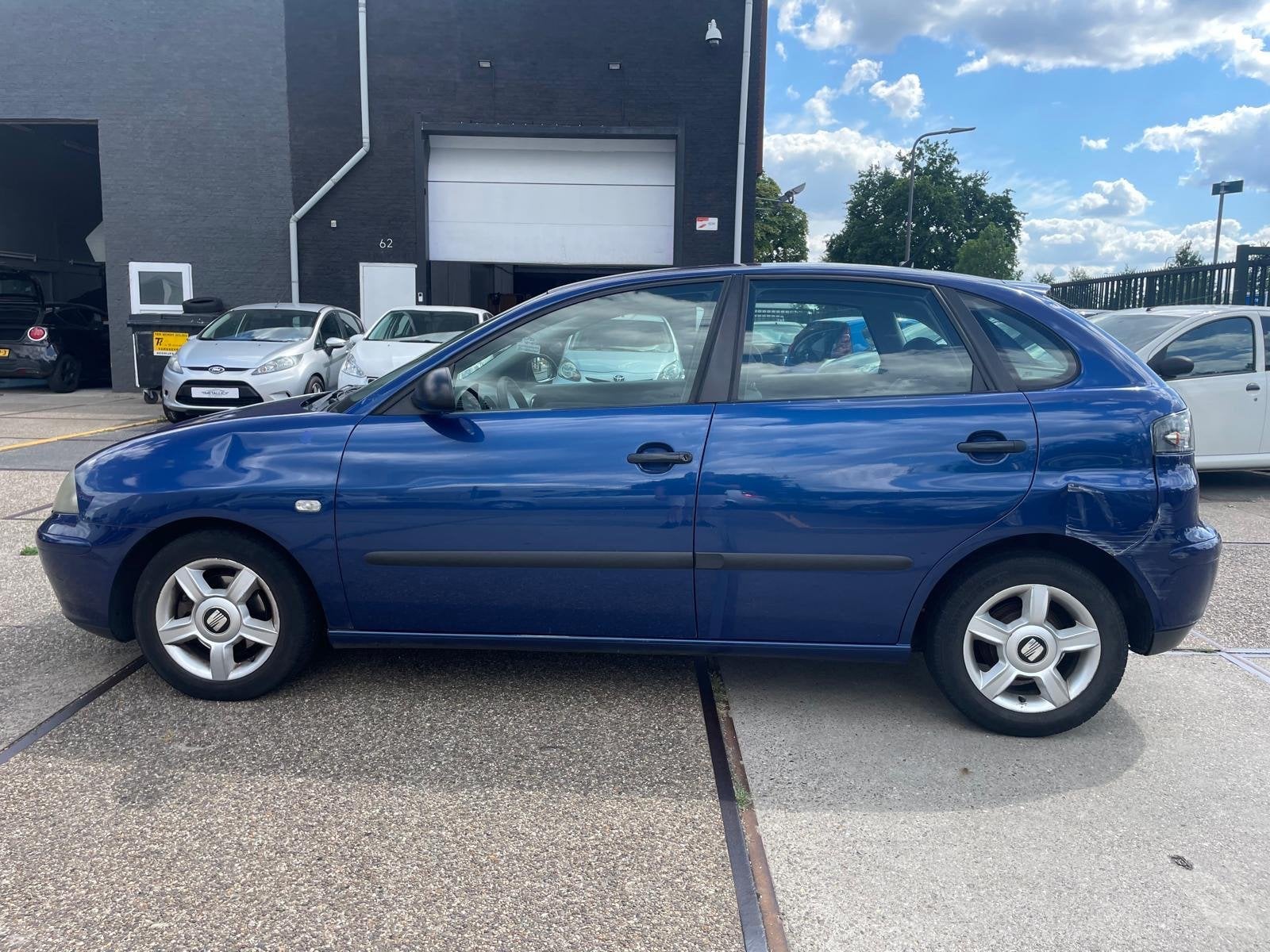 Seat Ibiza 1.4-16V Stella, Auto's, Seat, Voorwielaandrijving, 15 km/l, Blauw, Ibiza