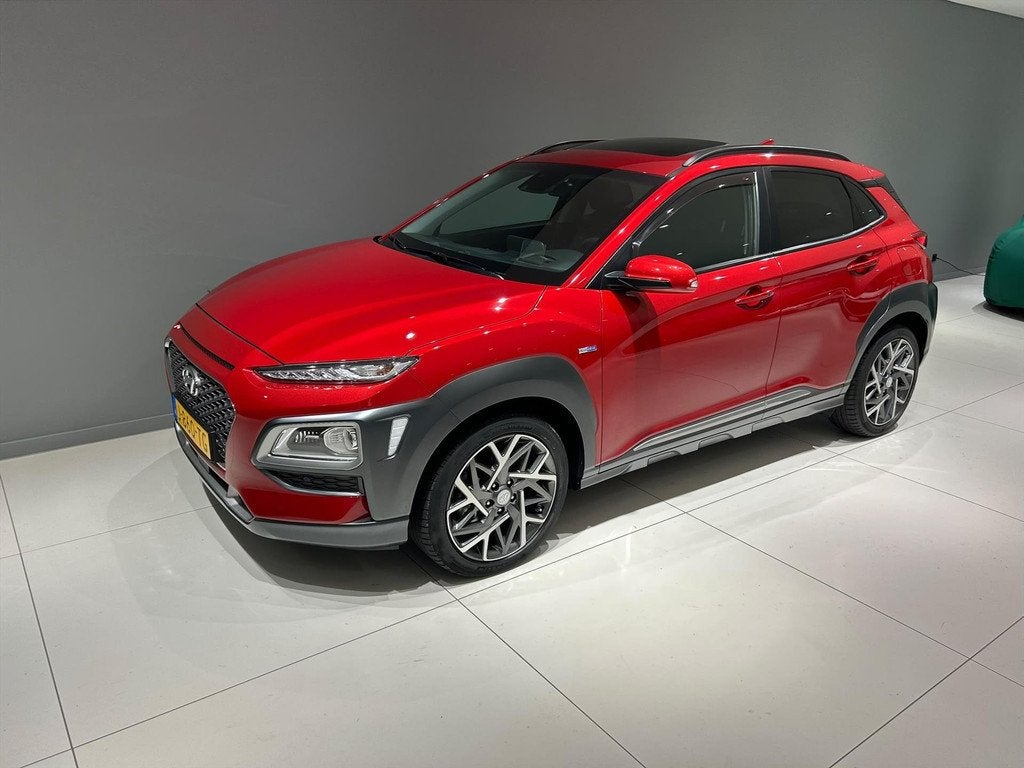 HYUNDAI Kona GDI 141pk HEV 2WD Automaat Premium Sky Unieke K, Auto's, Hyundai, Automaat, 12 maanden, Gebruikt, Leder en Stof