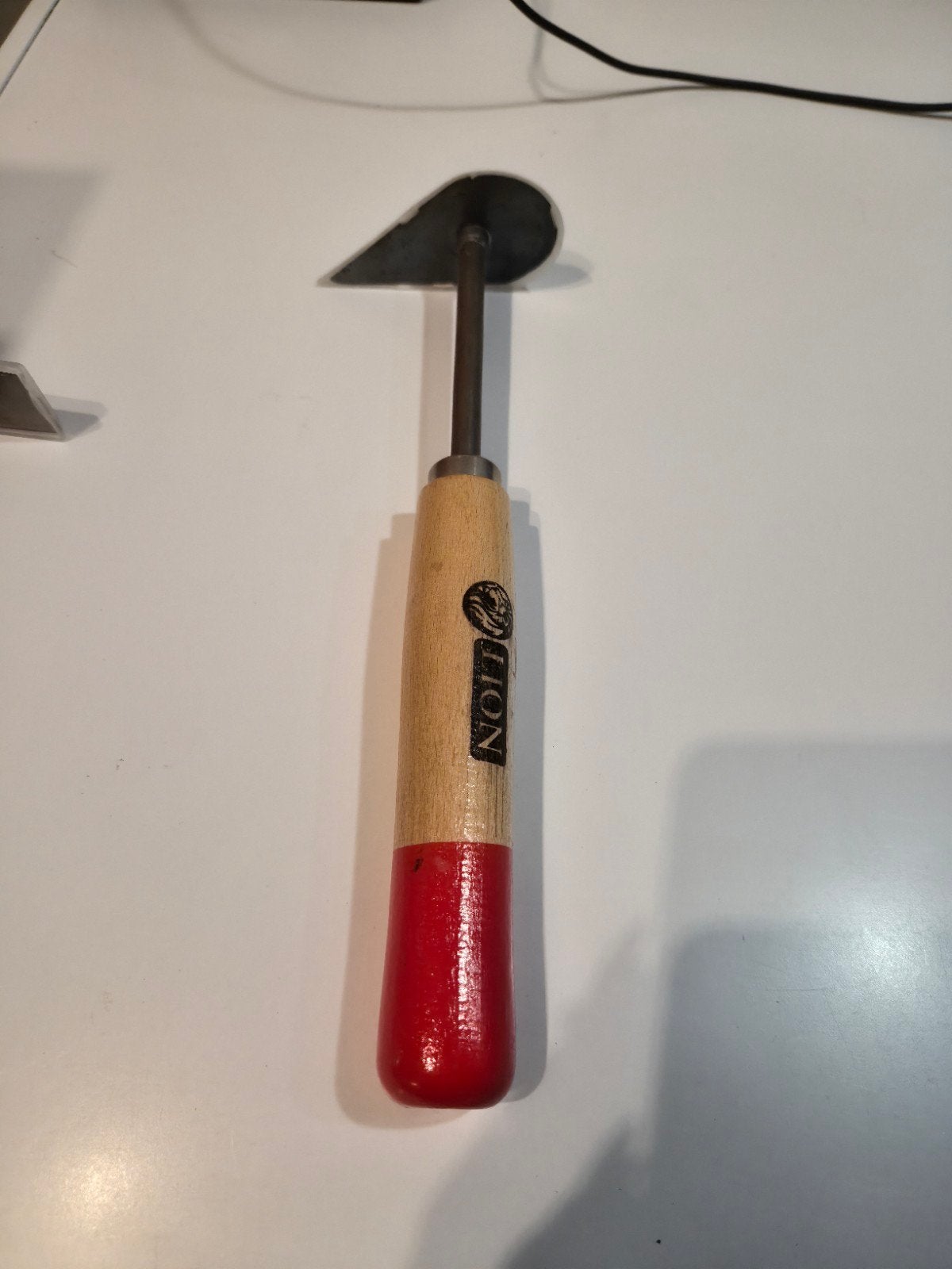Nieuwe Lion schraper/krabber met houten handvat, Ophalen of Verzenden, Nieuw, Overige typen, Overige merken