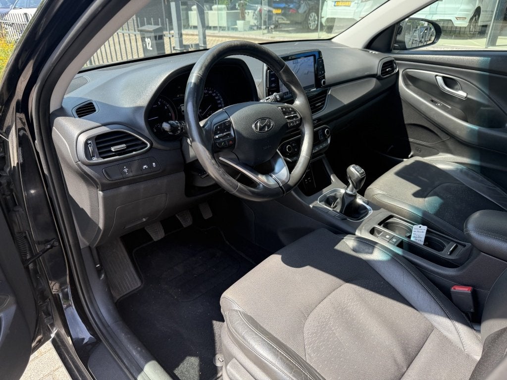 Hyundai i30 Wagon 1.4 T-GDI Premium | Navi | Camera | Clima, Auto's, Hyundai, 4 cilinders, Leder en Stof, Zwart, Origineel Nederlands
