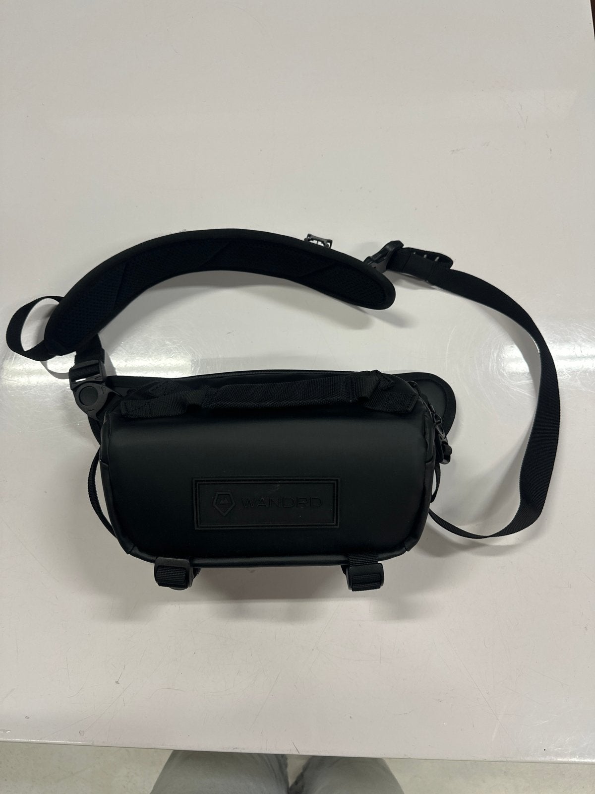 WANDRD Roam Sling 3L - Zwarte Sling Bag, Ophalen of Verzenden, Nieuw, Zwart, Overige merken