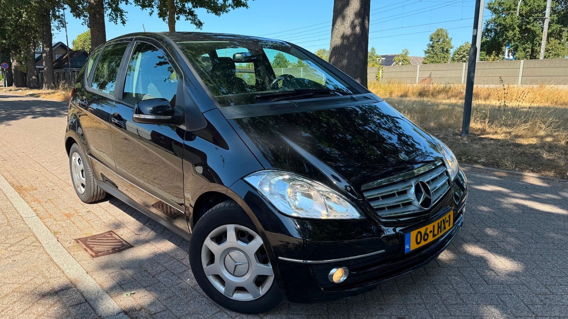 Mercedes-Benz A-klasse 160 Business Class Avantgarde AUTOMAA, 15 km/l, Leder en Stof, Zwart, Navigatiesysteem