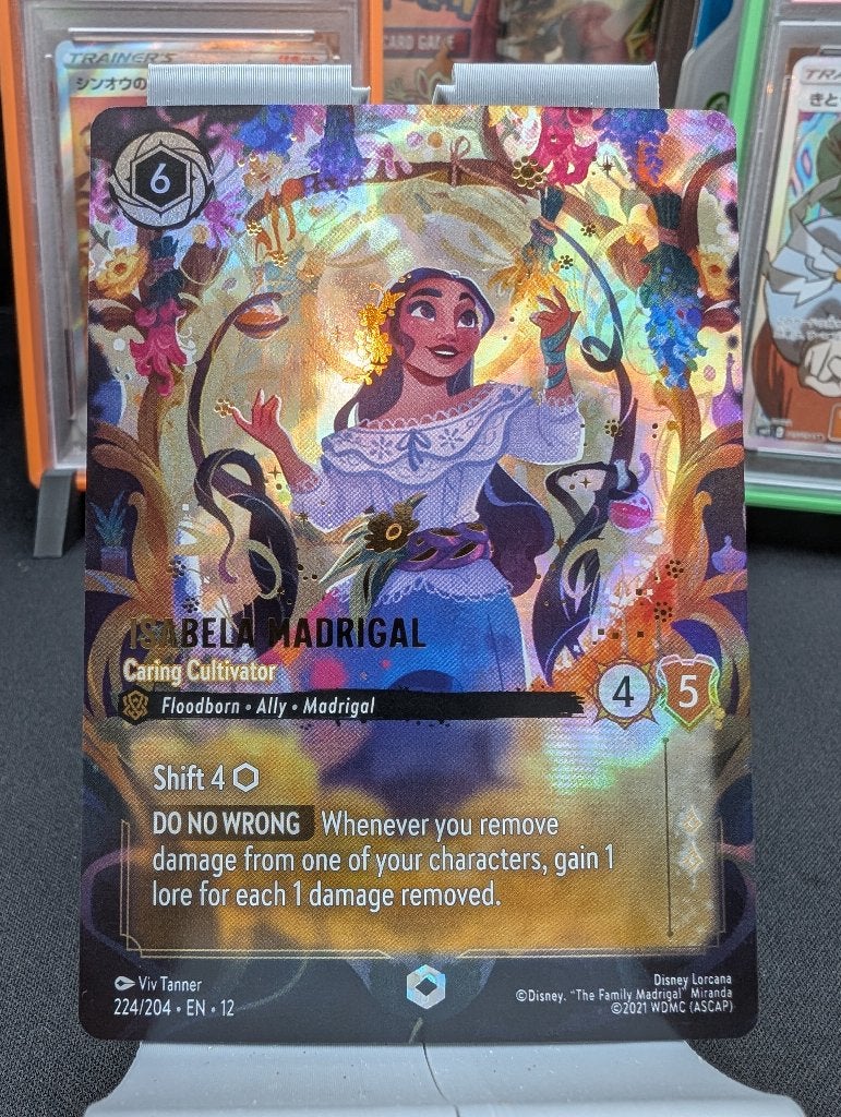 Lorcana Isabella Madrigal Enchanted 224/204 – Wilds Unknown, Ophalen of Verzenden, Nieuw, Losse kaart, Foil