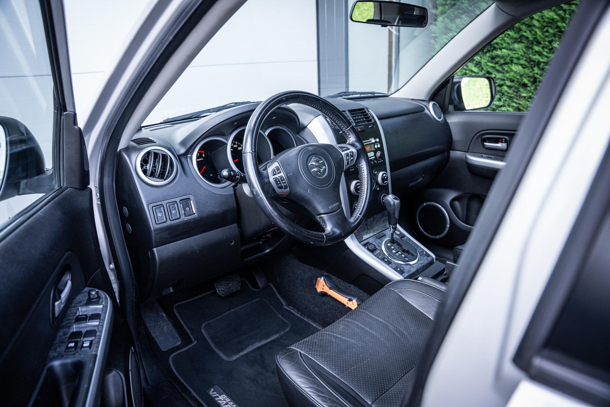Suzuki Grand Vitara 2.4 4WD 169pk AUT High Executive |Schuif, Auto's, Automaat, Gebruikt, 4 cilinders, Stoelverwarming