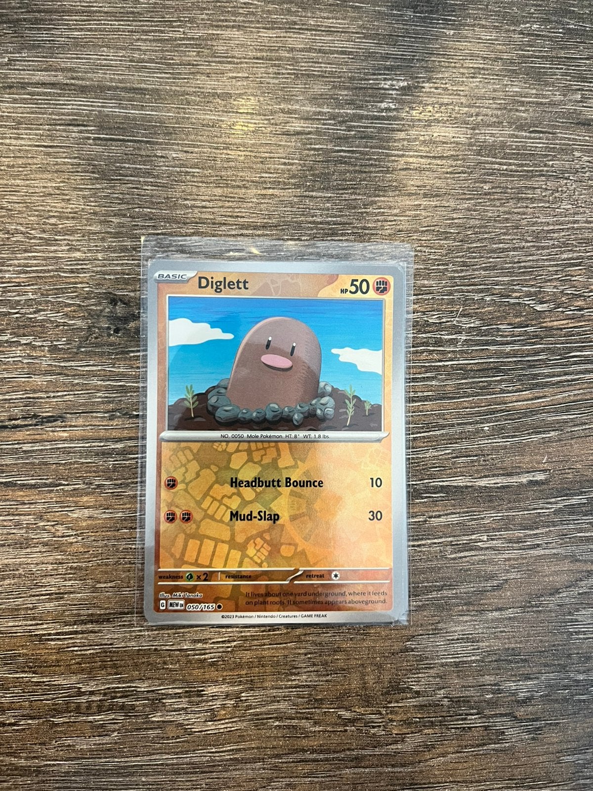 Diglett MEW 050/165 reverse holo, Ophalen of Verzenden, Zo goed als nieuw