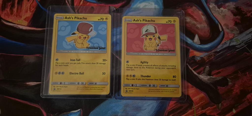 Pokémon kaart: twee Ash's Pikachu SM109/ SM113, Ophalen of Verzenden, Zo goed als nieuw, Meerdere kaarten, Foil