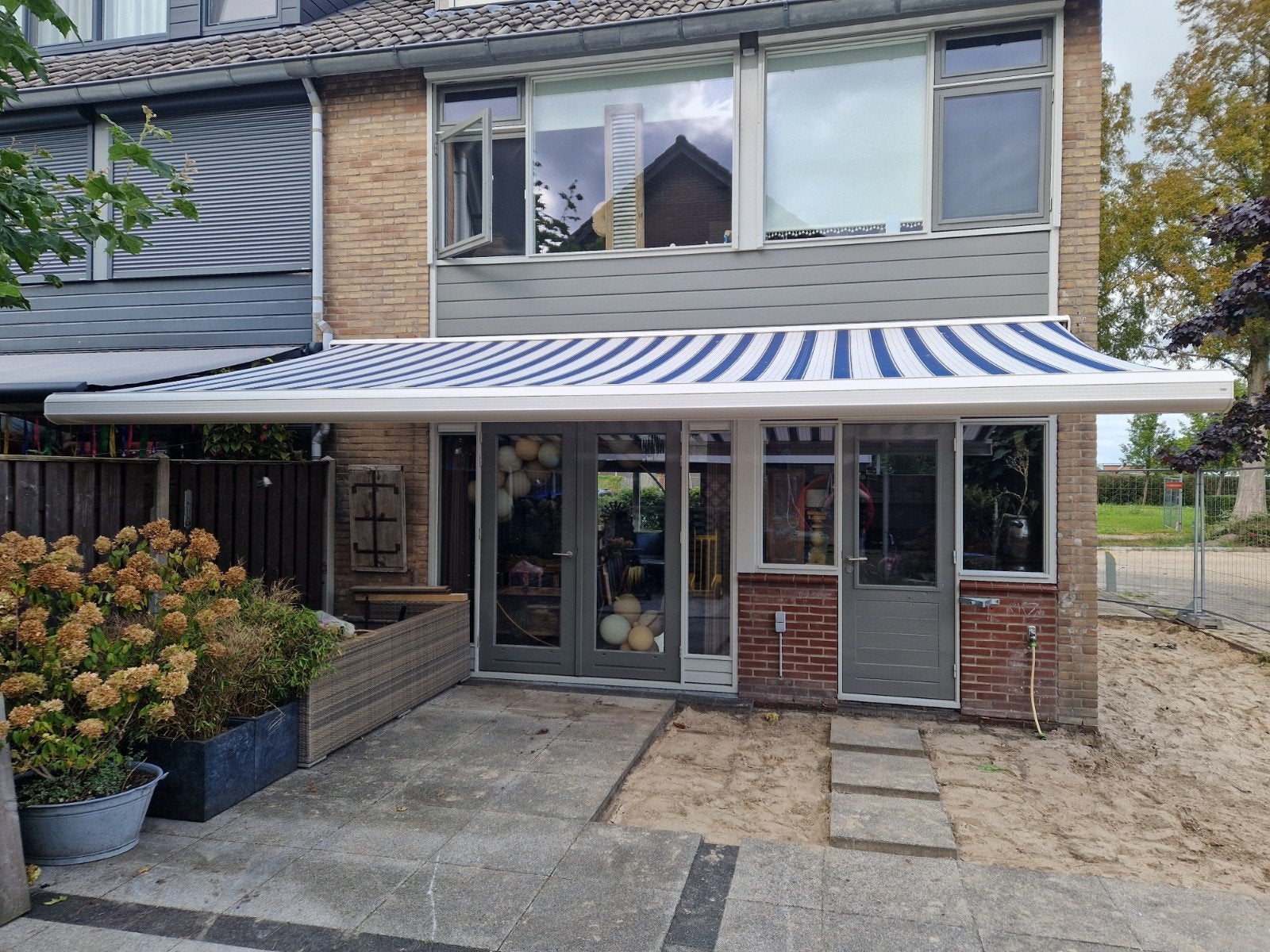 Rainbow Zonnescherm 6m breed, 2.7m uitval - Zeer goede staat, Tuin en Terras, Ophalen, 450 cm of meer, Elektrisch, Zo goed als nieuw