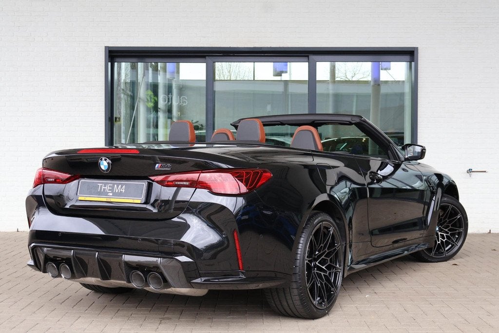 BMW M4 Cabrio Competition Innovation Pack | M Drive Professi, Auto's, BMW, Automaat, Cabriolet, 4 stoelen, Zwart