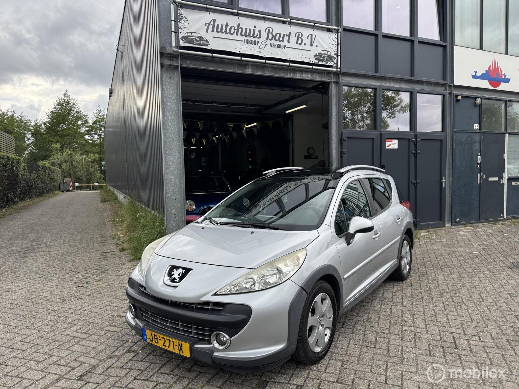 Peugeot 207 SW 1.6 VTi XS Première Airco! Panodak! APK! NAP, Metallic lak, Zwart, 4 cilinders, Leder en Stof