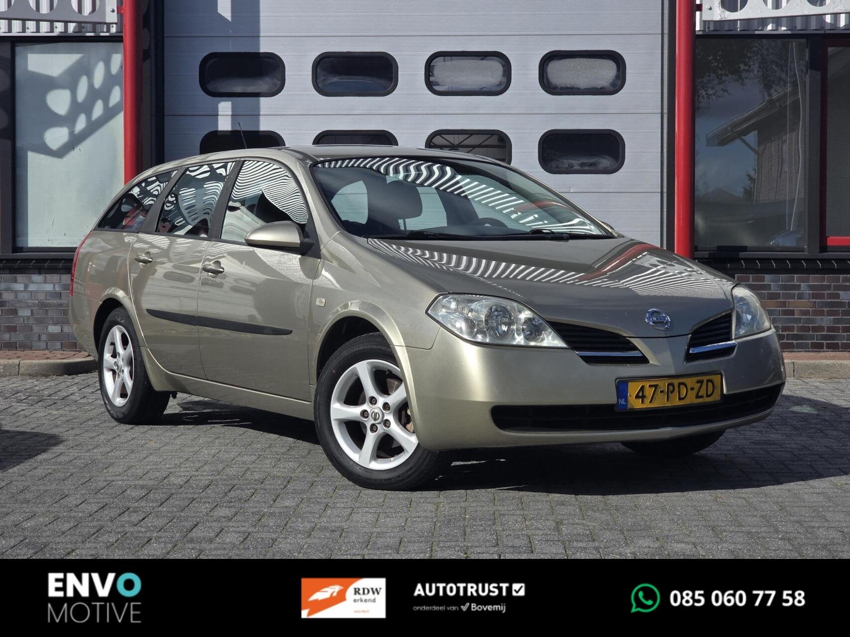 Nissan Primera Estate 1.8 Visia Automaat Navi/Cruise/Clima, Auto's, Stof, Gebruikt, 4 cilinders, 700 kg
