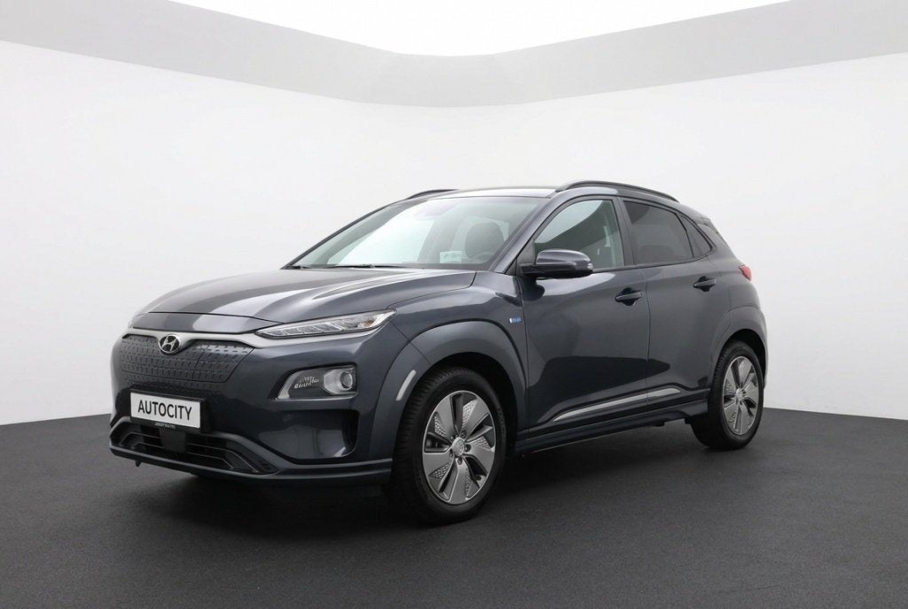 Hyundai KONA EV Premium 64 kWh 100% SOH Origineel NL | Leder, Auto's, Automaat, 0 cilinders, Gebruikt, Leder