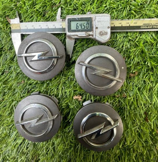 Originele Opel Naafdoppen 64.5 mm, Auto diversen, Ophalen of Verzenden, Gebruikt