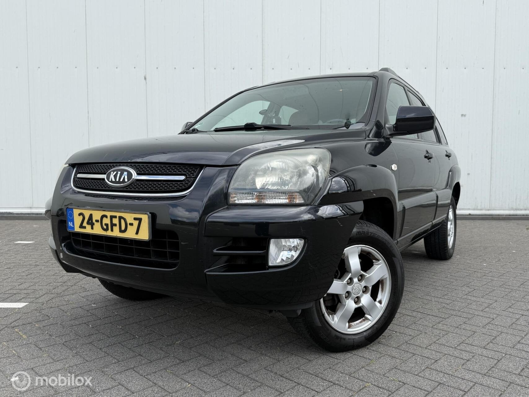 Kia Sportage 2.0 X-ception Airco Trekhaak Stoelverwarming, Auto's, Kia, 1442 kg, Gebruikt, 4 cilinders, Zwart