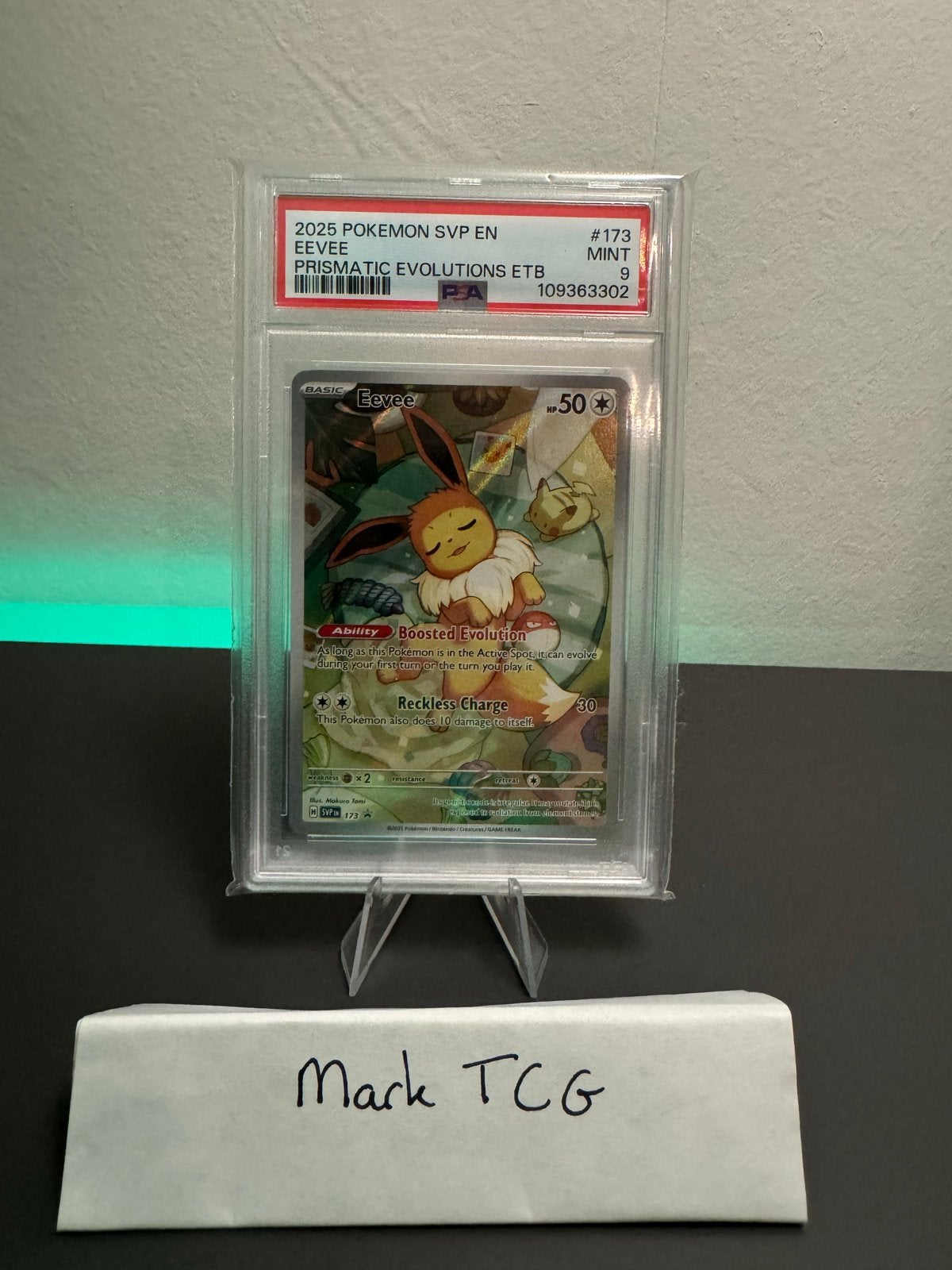 Eevee 2025 SVP EN #173 PSA 9 MINT Prismatic Evolutions ETB, Hobby en Vrije tijd, Verzamelkaartspellen | Pokémon, Ophalen of Verzenden