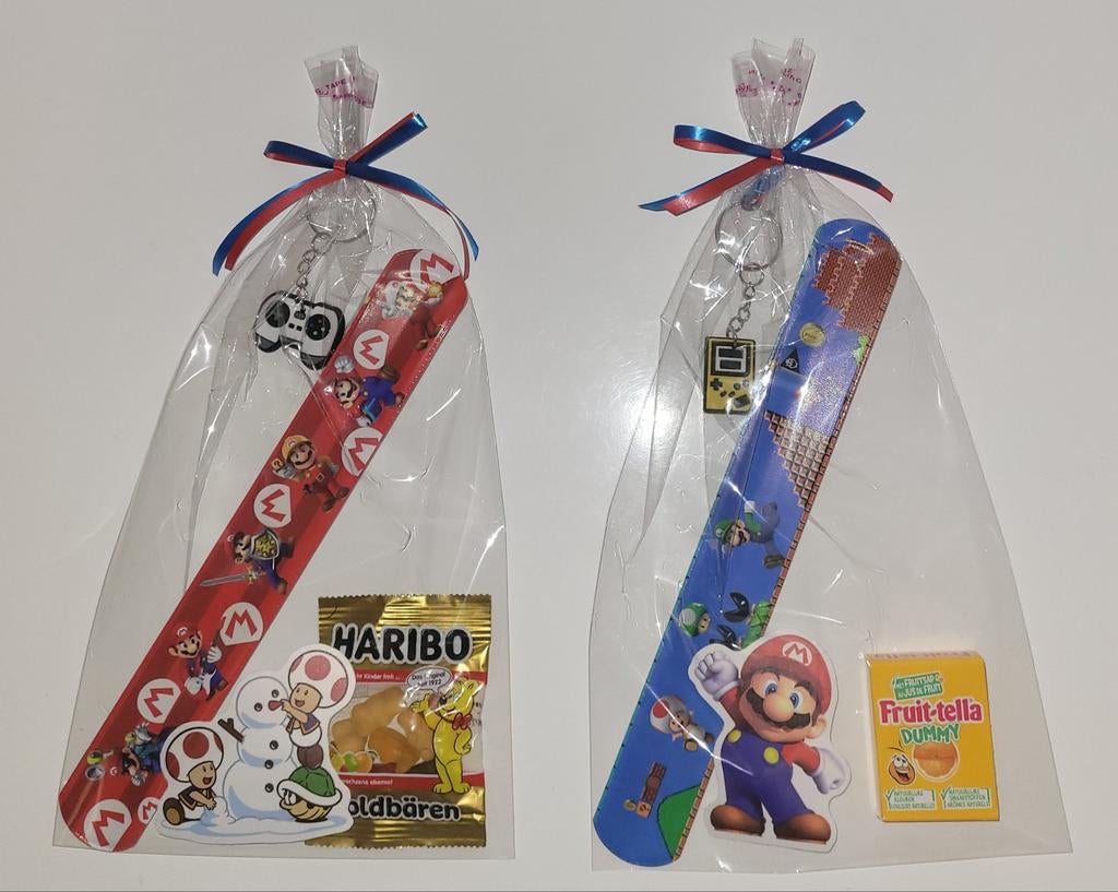 Traktatie Mario klaparmband, sticker, sleutelhanger, snoepje, Ophalen of Verzenden, Nieuw, Feestartikel, Verjaardag