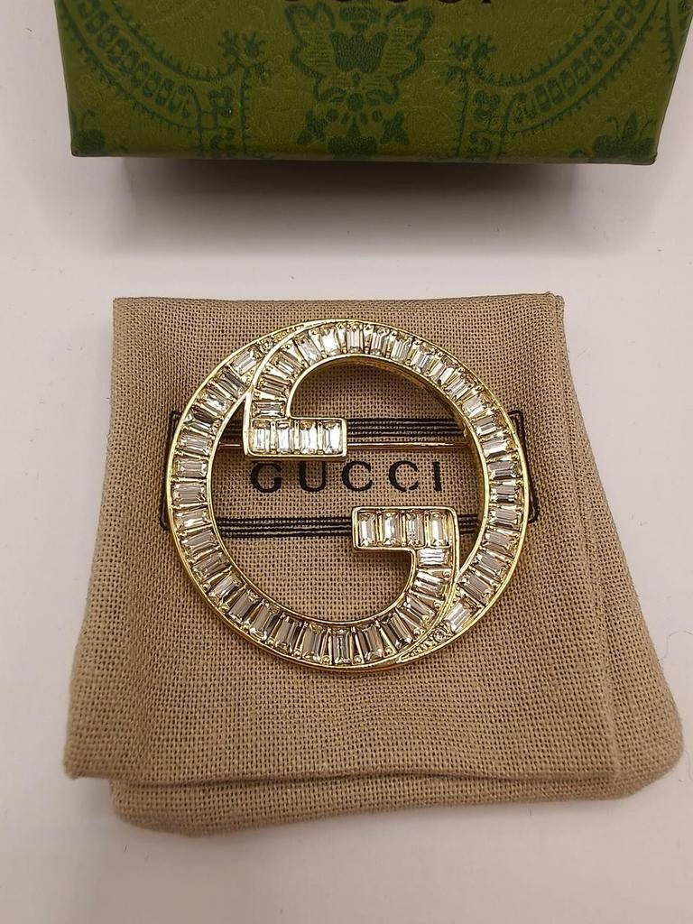 Gucci broche met kristallen, Sieraden, Tassen en Uiterlijk, Broches, Ophalen of Verzenden, Nieuw, Goud, Overige materialen