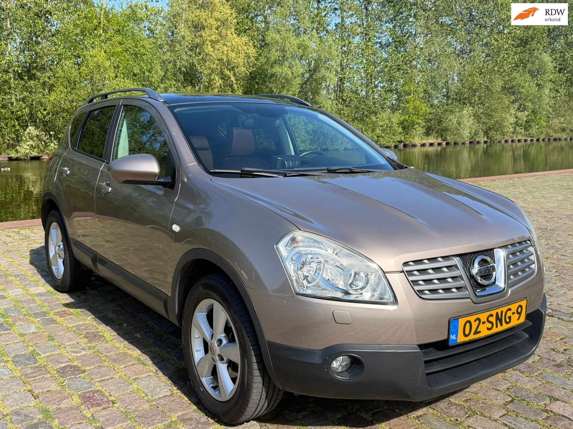 Nissan Qashqai 2.0 Tekna 4WD Automaat 1e eigenaar dealer ond, Automaat, Bruin, Leder, Vierwielaandrijving