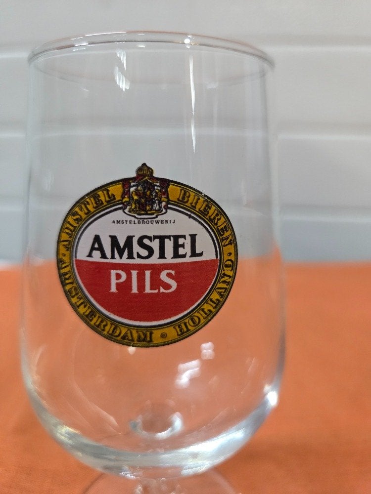 amstel bierglas op voet 25 cl, Ophalen of Verzenden, 'T Olde Gre-j, Info@toldegrej.nl, Endepoelstraat 20f Didam