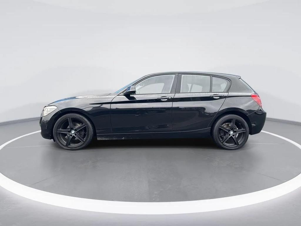BMW 1-Serie 116I 100KW 5DR 2011 Zwart, Auto's, BMW, 1-Serie, 4 cilinders, Zwart, 1200 kg